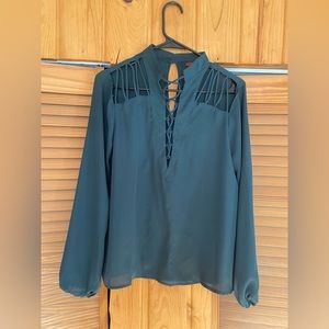 Women’s teal blouse